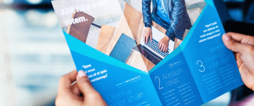 hands-holding-business-brochure_250865-389